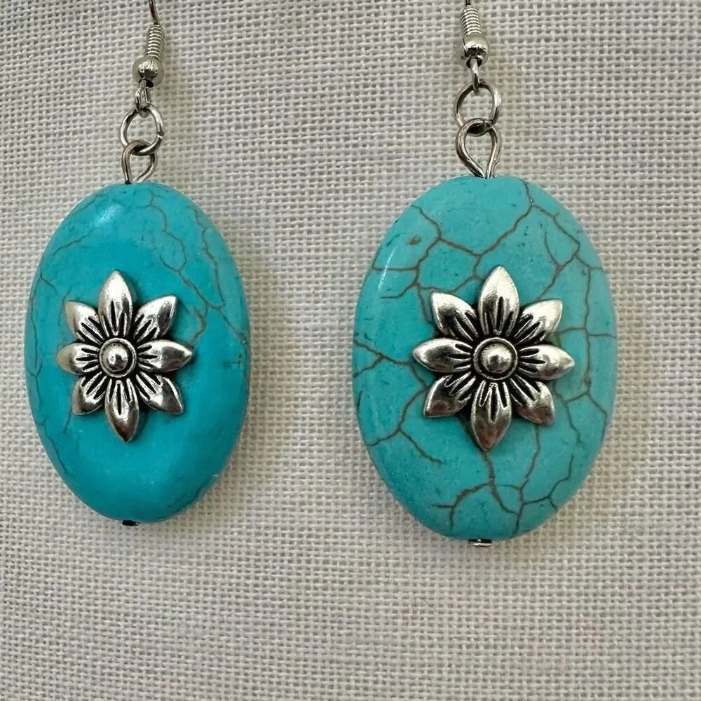 Blue and silver tone oval drop earrings